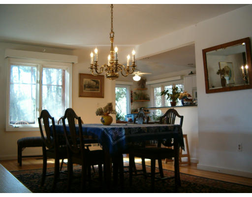 575 Station Road Amherst, MA 01002 - Photo 2 of 11 a view of a dining room with furniture window and outside view