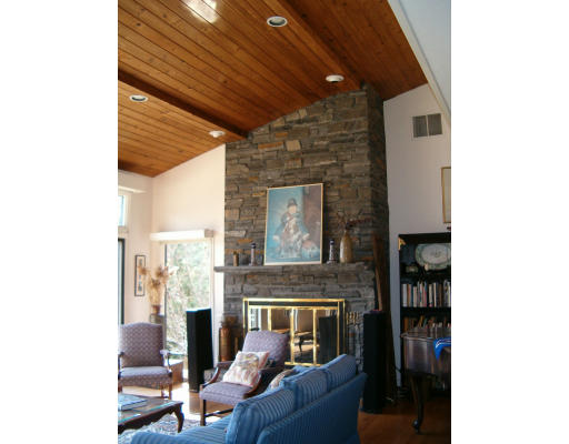 575 Station Road Amherst, MA 01002 - Photo 3 of 11 a living room with furniture and a fireplace