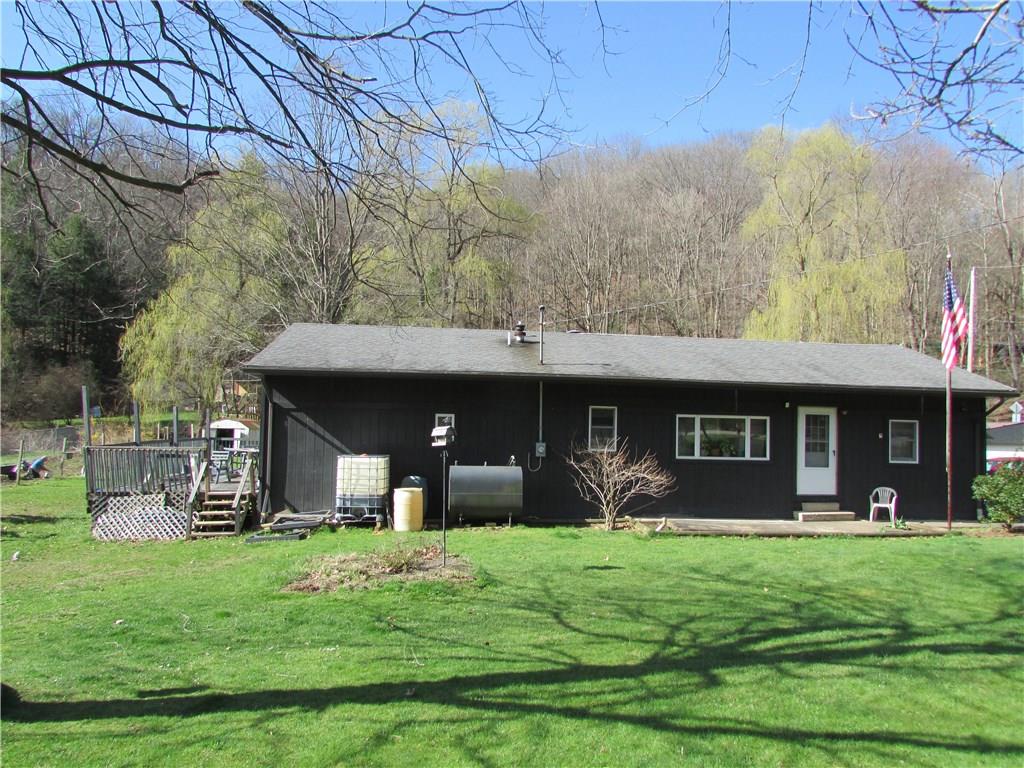 103 Platt Road Clinton, PA 15026 - Photo 1 of 14 EXTERIOR FRONT OF HOME. LARGE SIDE DECK AND FRONT PATIO.