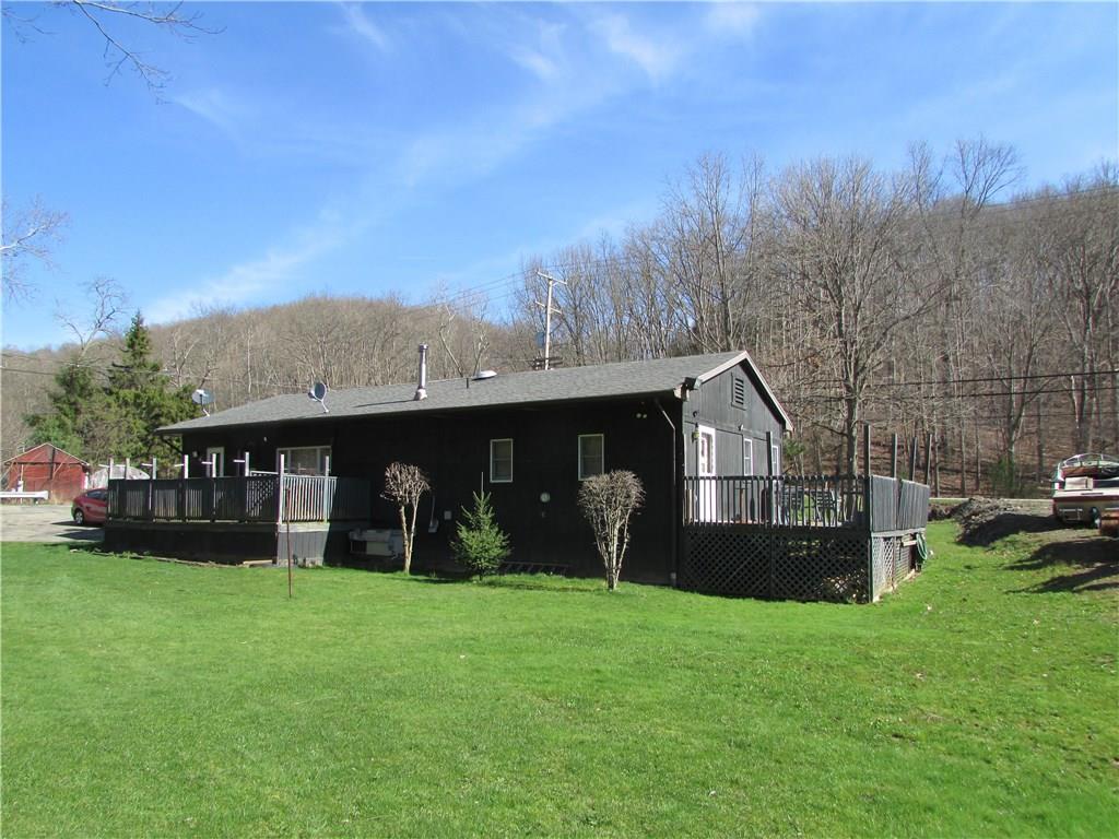 103 Platt Road Clinton, PA 15026 - Photo 2 of 14 EXTERIOR BACK OF HOME. REAR AND SIDE DECK.