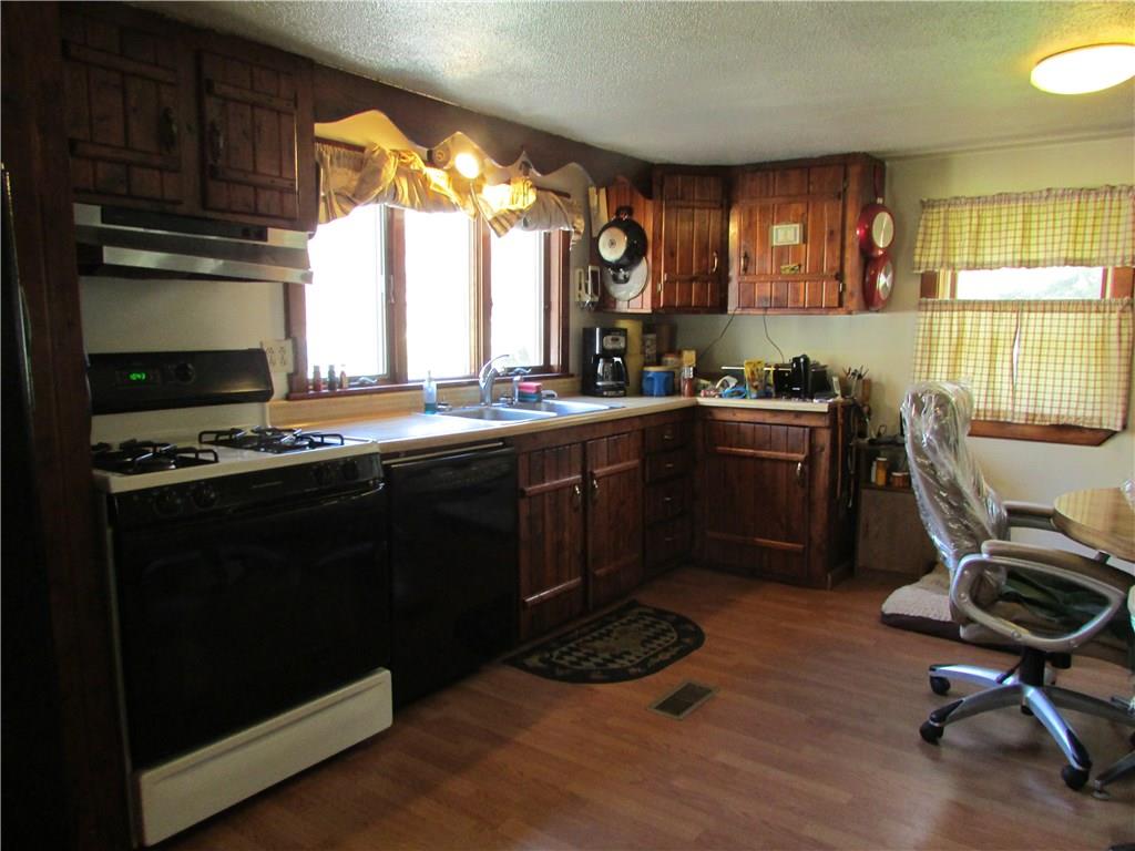 103 Platt Road Clinton, PA 15026 - Photo 4 of 14 LAMINATE FLOORING AND CUSTOM CABINETS .