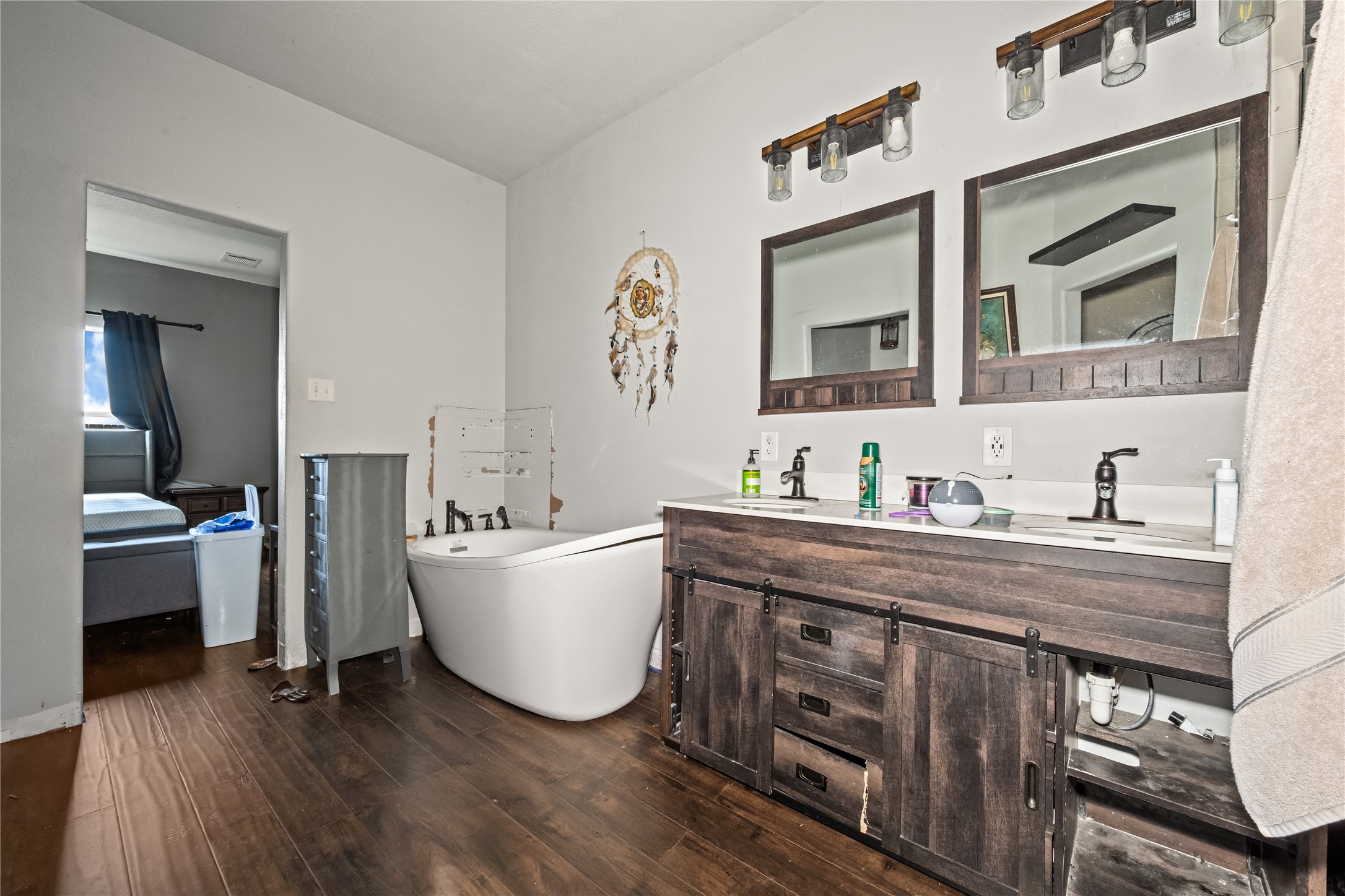 28832 San Bernard River Loop Spring, TX 77386 - Photo 23 of 50 a bathroom with a bathtub sink and mirror