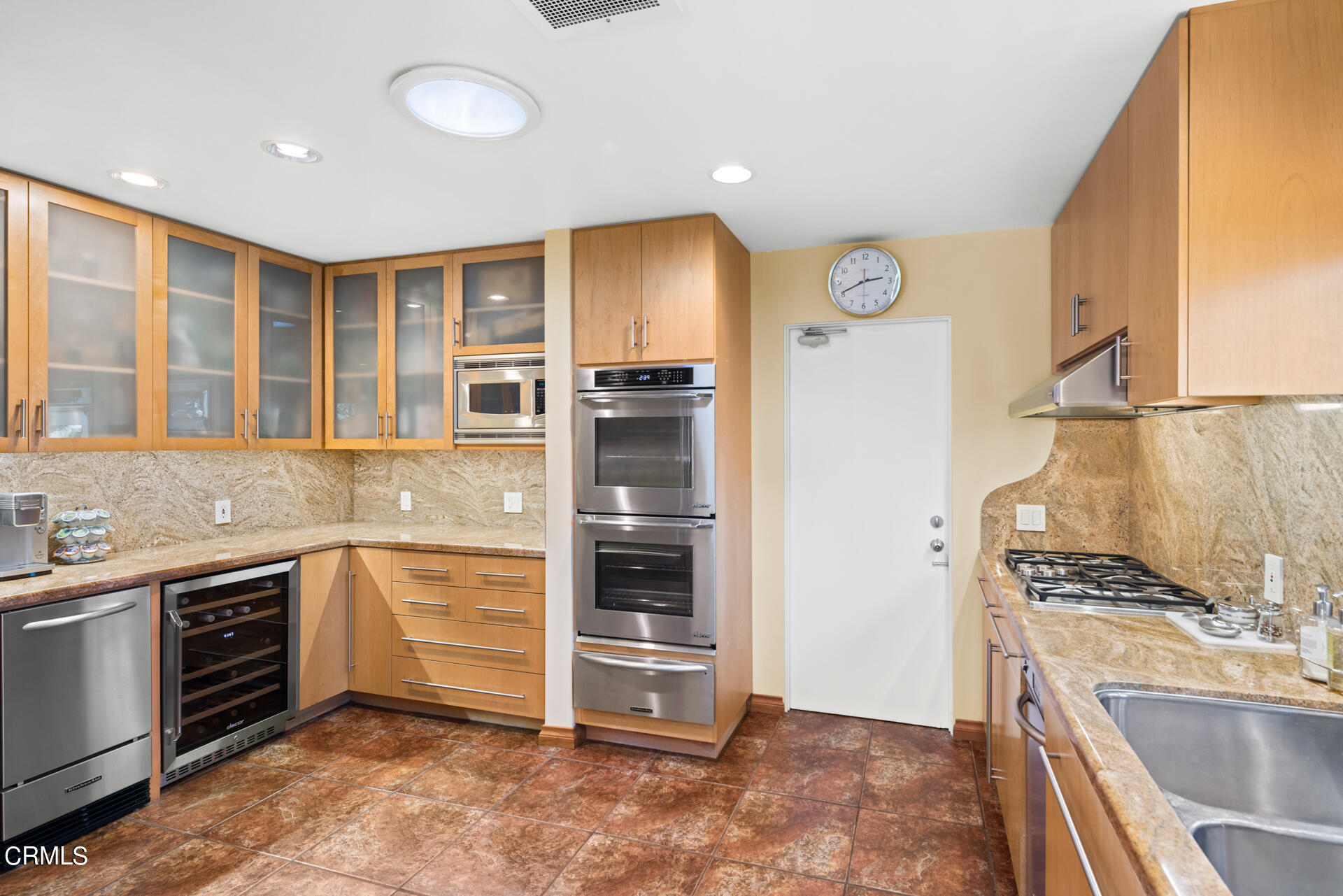 1470 Pegfair Estates Drive Pasadena, CA 91103 - Photo 11 of 48 a kitchen with stainless steel appliances granite countertop a stove and a sink