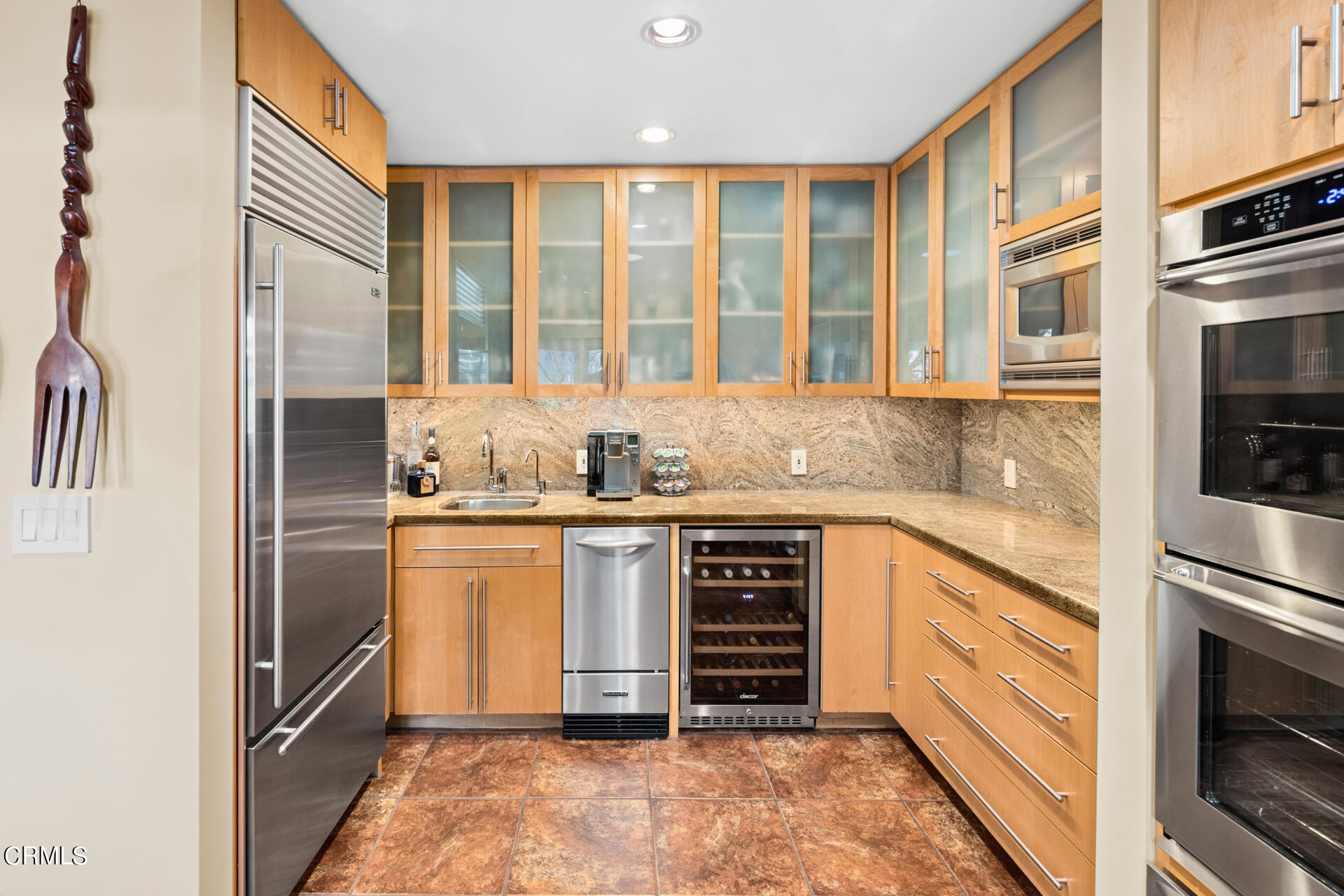 1470 Pegfair Estates Drive Pasadena, CA 91103 - Photo 12 of 48 a kitchen with granite countertop stainless steel appliances and cabinets