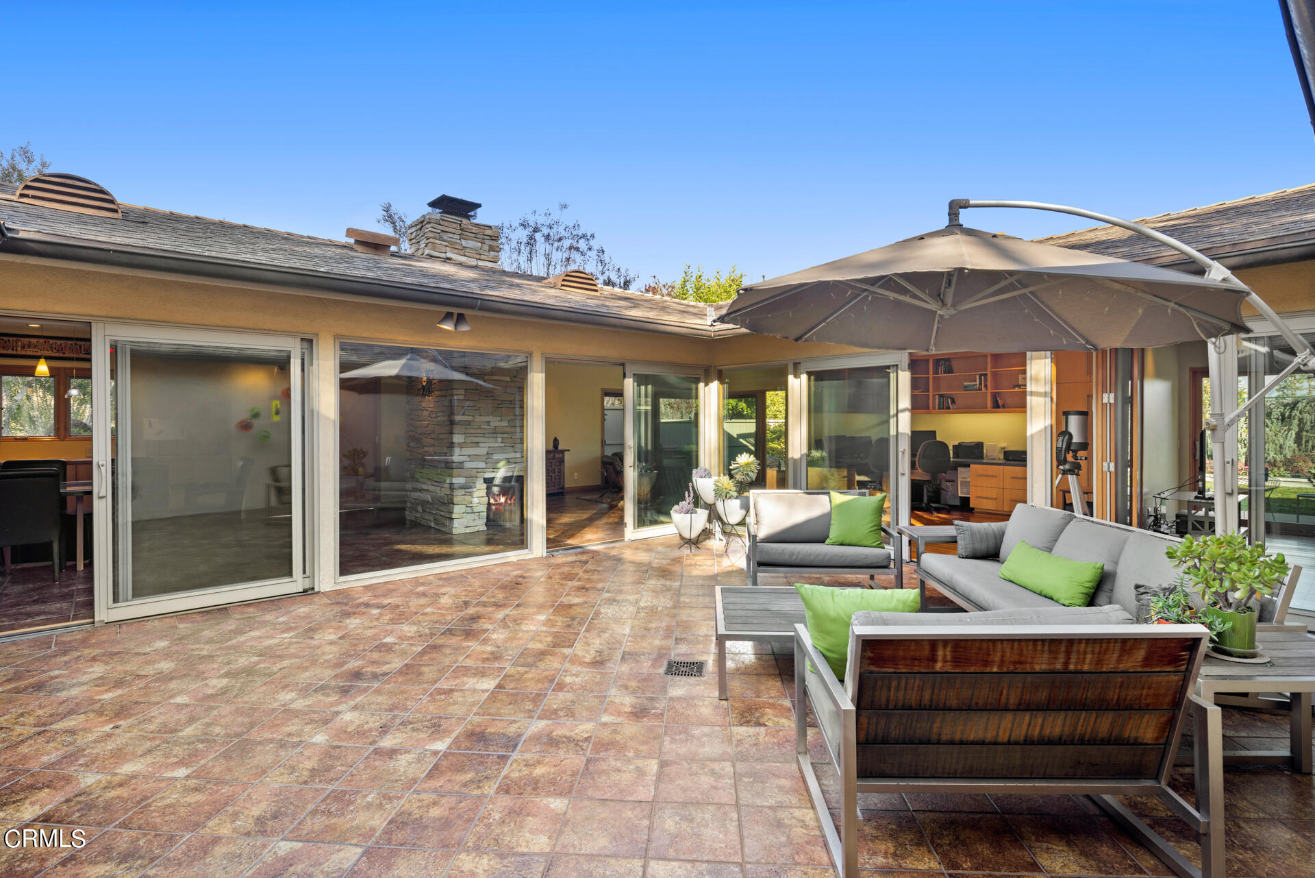 1470 Pegfair Estates Drive Pasadena, CA 91103 - Photo 15 of 48 a view of a house with backyard porch and furniture