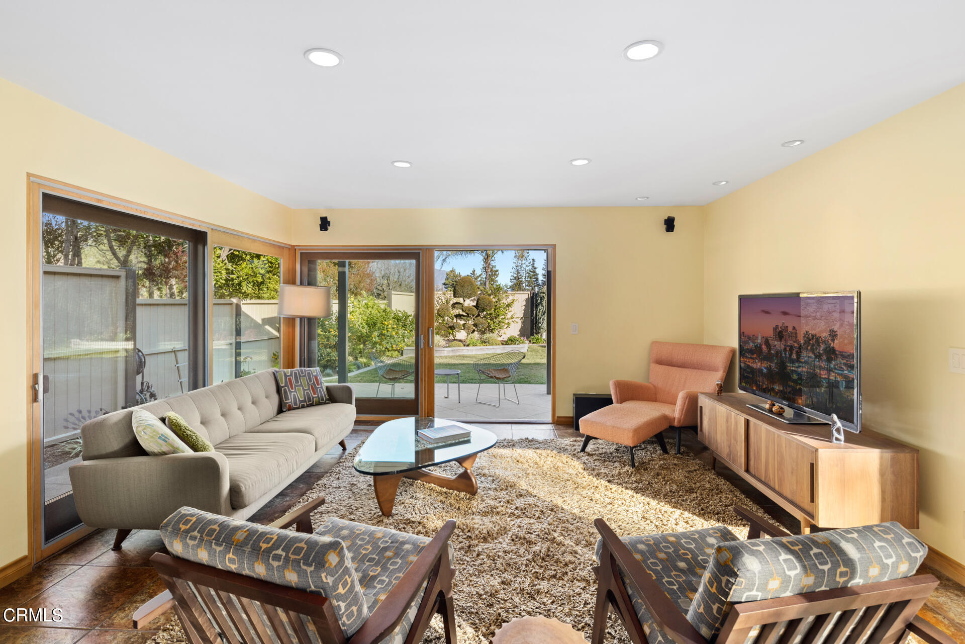 1470 Pegfair Estates Drive Pasadena, CA 91103 - Photo 17 of 48 a living room with furniture large windows and wooden floor