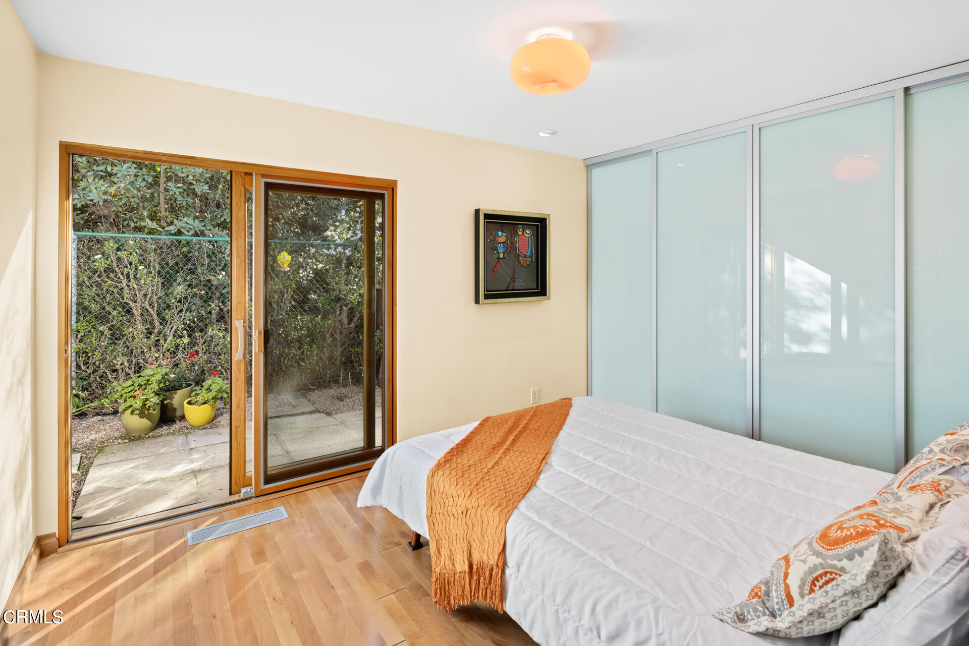 1470 Pegfair Estates Drive Pasadena, CA 91103 - Photo 32 of 48 a bedroom with a bed and a painting on the wall