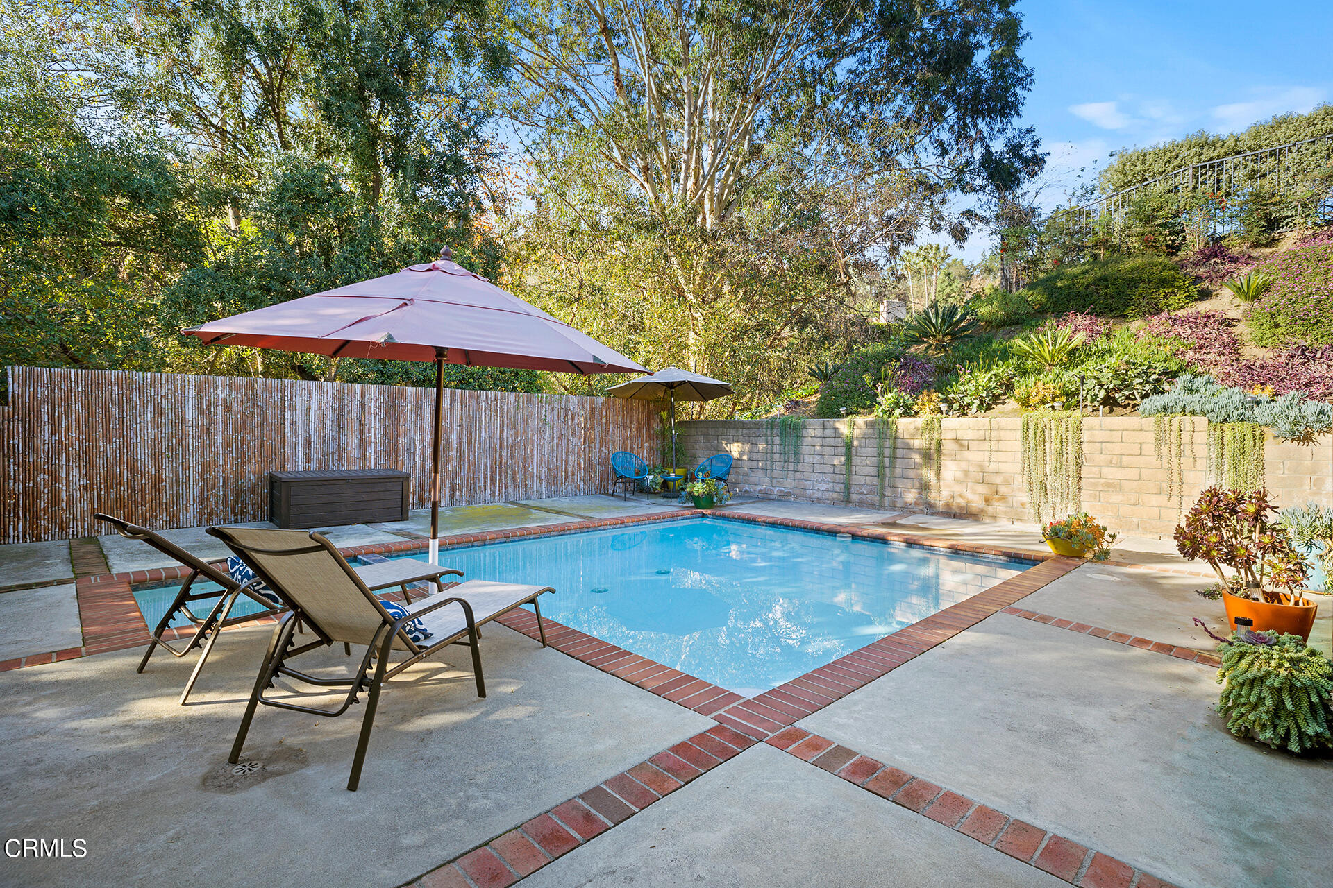 1470 Pegfair Estates Drive Pasadena, CA 91103 - Photo 44 of 48 a backyard of a house with table and chairs