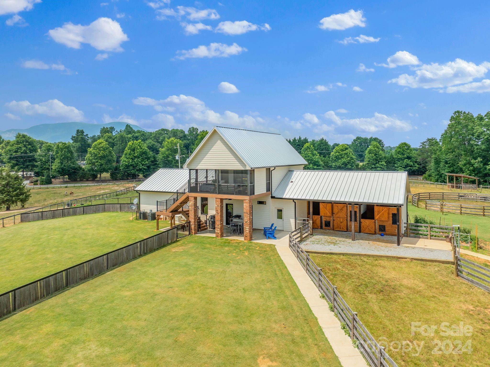 710 Tugaloo Road Landrum, SC 29356 - Photo 3 of 44 a view of swimming pool with seating area