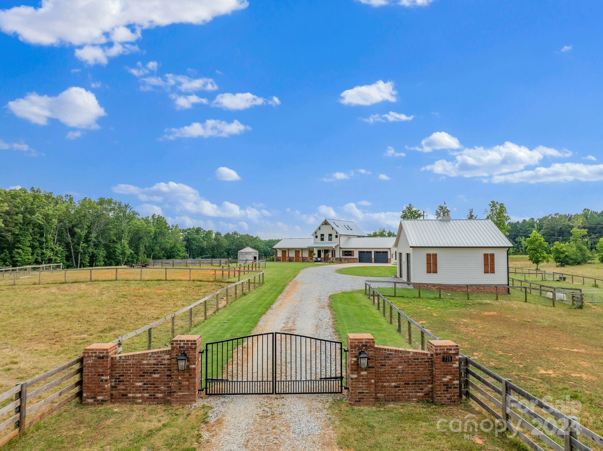 710 Tugaloo Road Landrum, SC 29356 - Photo 32 of 44 an aerial view of a house with a ocean view