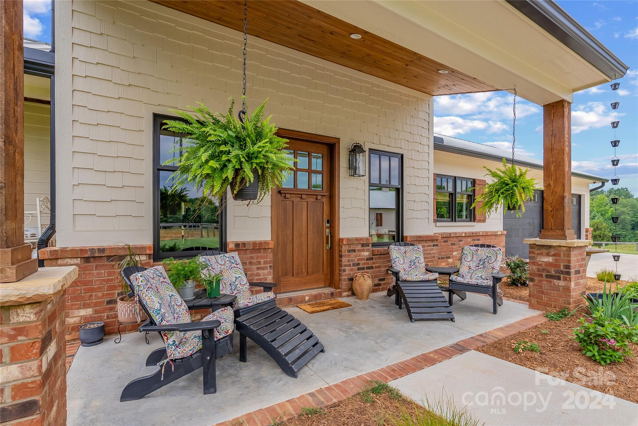 710 Tugaloo Road Landrum, SC 29356 - Photo 7 of 44 a building outdoor space with patio furniture