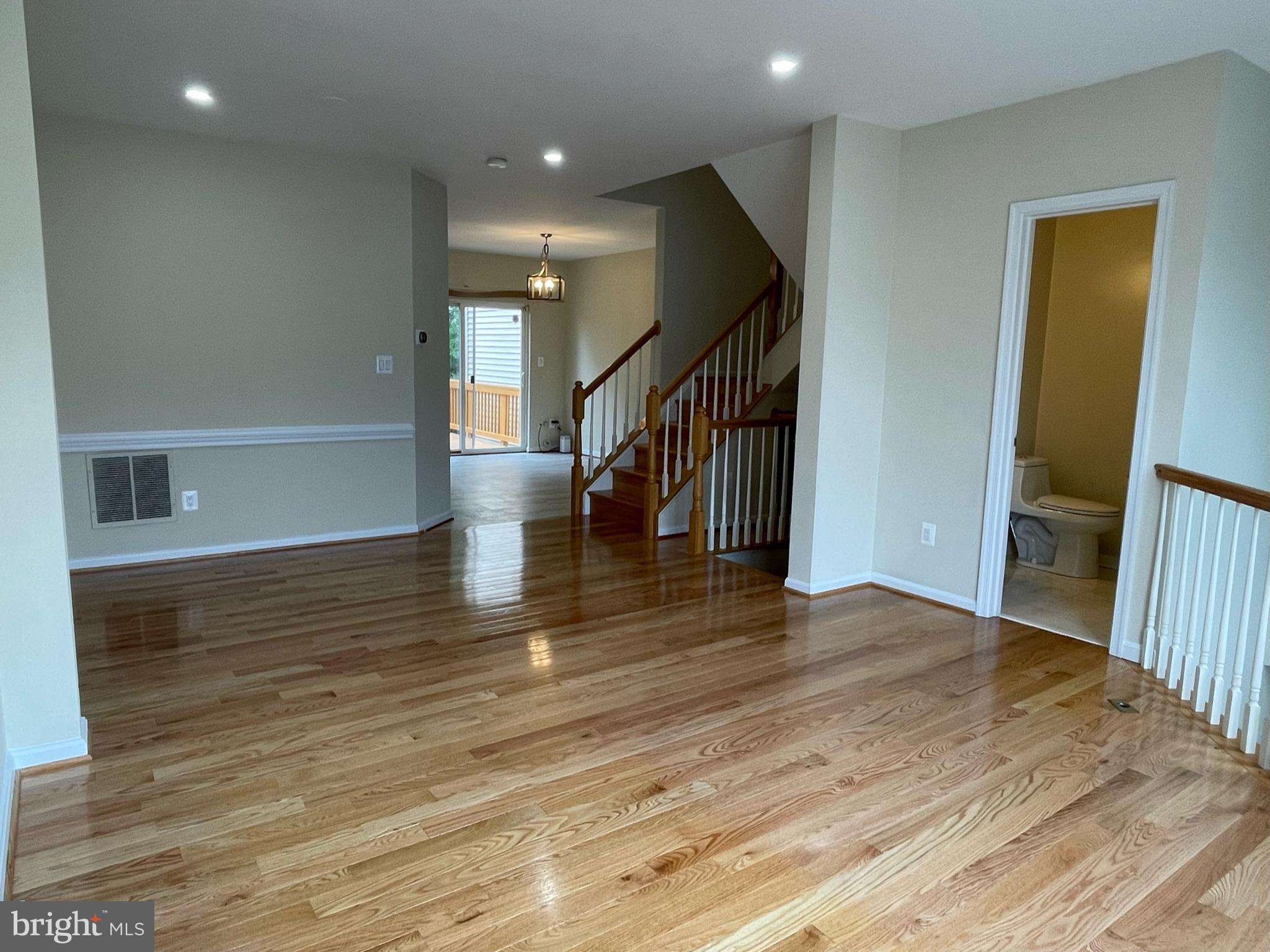 9058 Two Bays Road Lorton, VA 22079 - Photo 11 of 32 Living Room - Dining Room area with 2nd Powder Roo