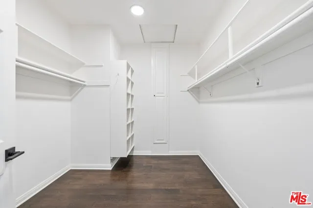 a view of an empty walk in closet
