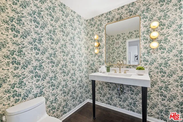 a bathroom with a sink and a toilet