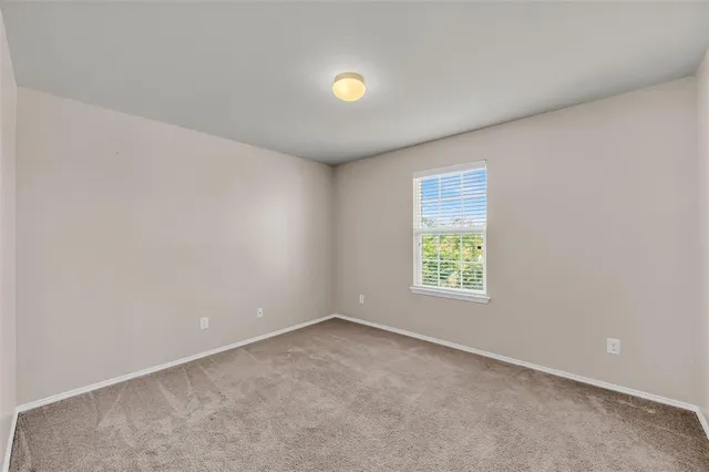 an empty room with window