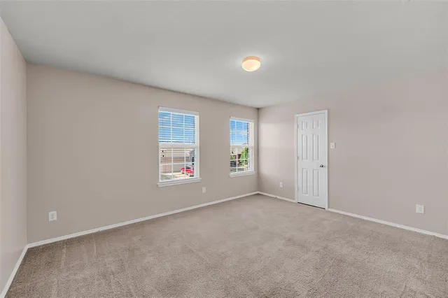 a view of an empty room with window