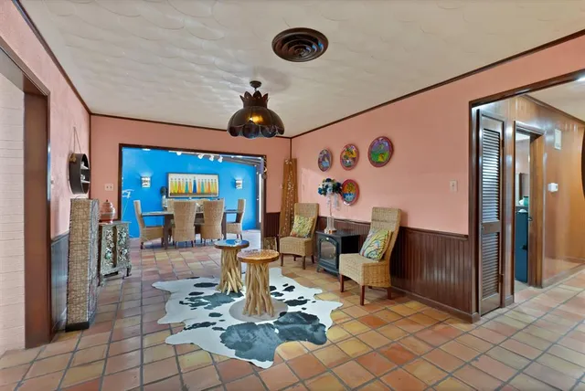 a view of a livingroom with furniture and front door