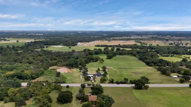 an aerial view of a city with lots of residential buildings