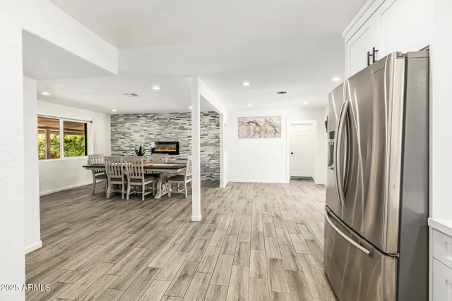 a bedroom with a bed and a ceiling fan