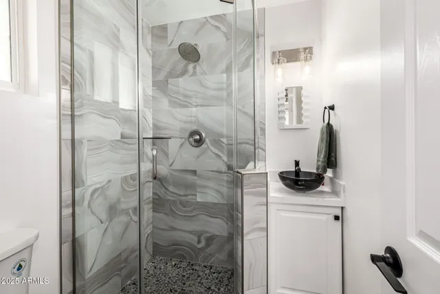 a view of a house with backyard porch and sitting area