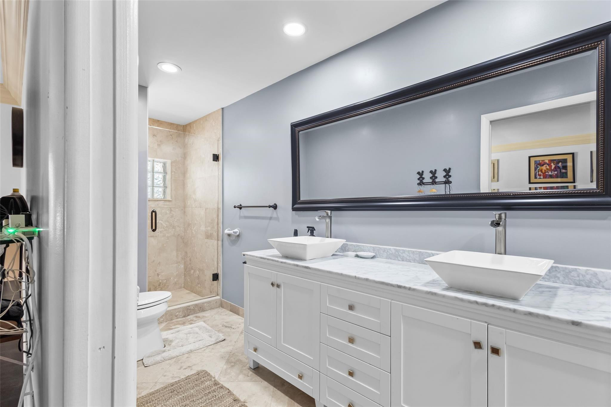 5223 Deerhurst Crescent Circle Boca Raton, FL 33486 - Photo 36 of 51 a bathroom with a sink and a mirror