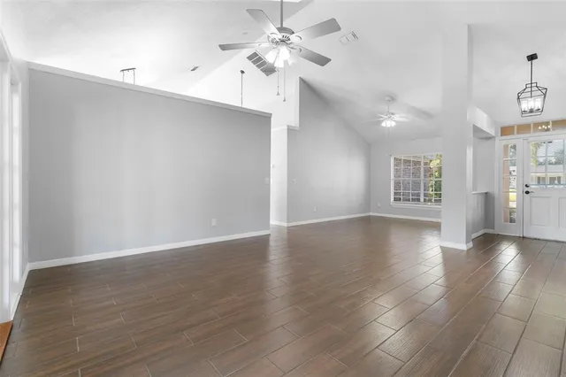 a view of an empty room with a window