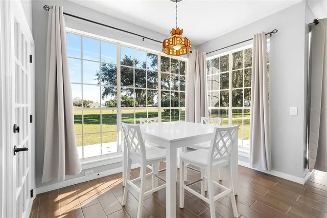 a bathroom with a sink toilet vanity and tub