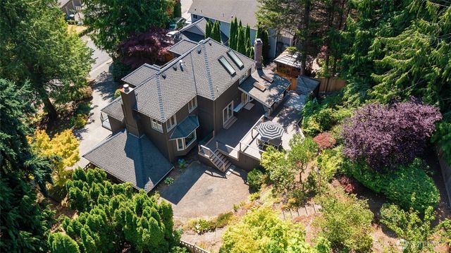 an aerial view of multiple houses with outdoor space