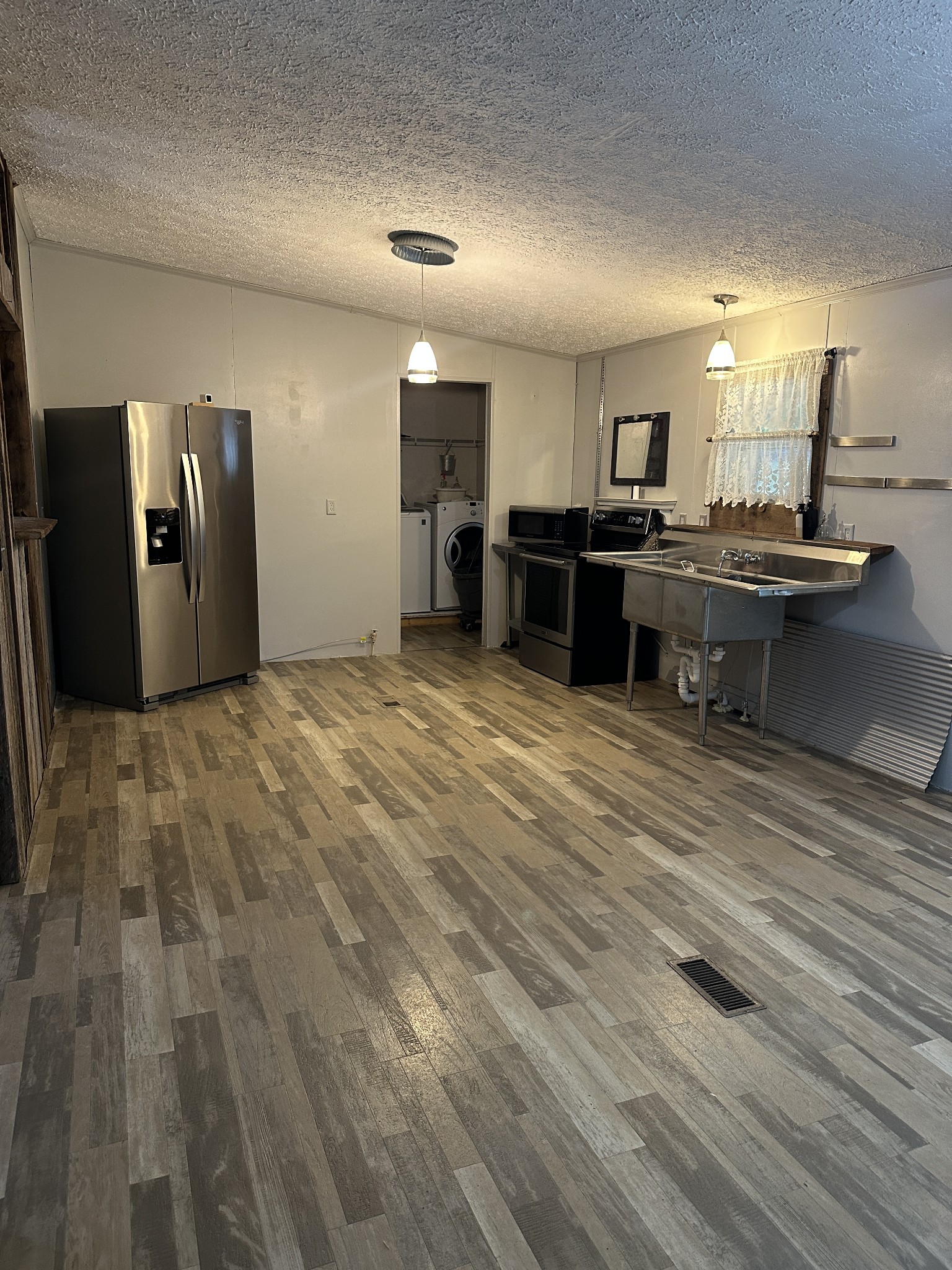 104 Limo View Lane Hohenwald, TN 38462 - Photo 12 of 67 a view of a kitchen with cabinets
