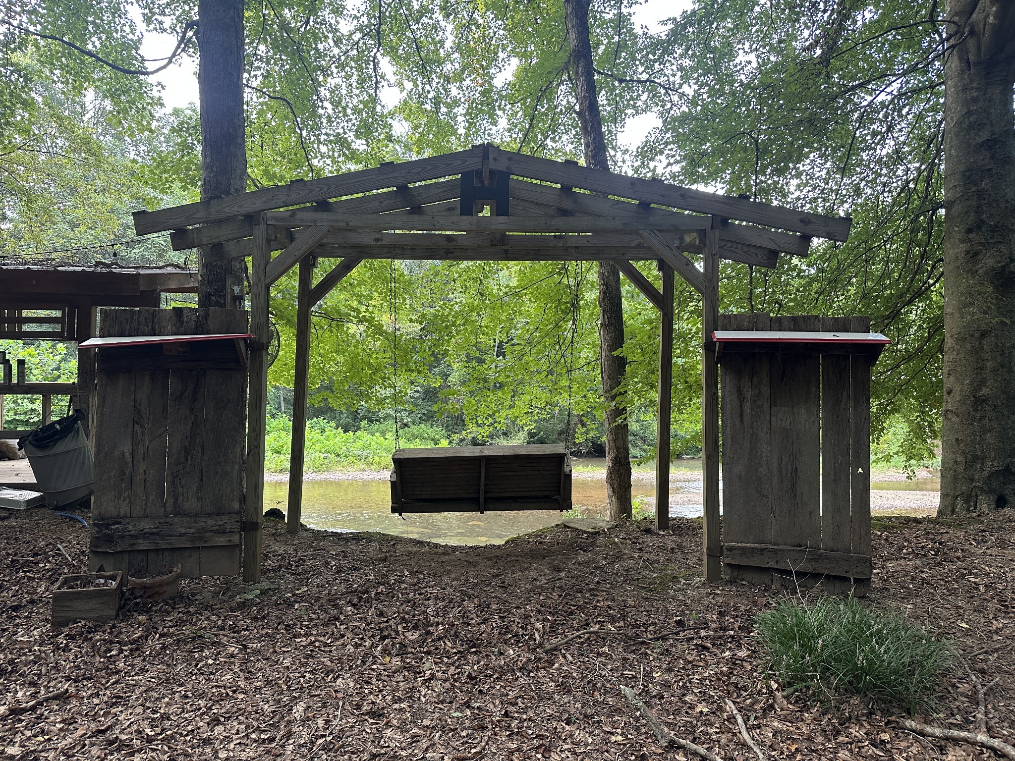 104 Limo View Lane Hohenwald, TN 38462 - Photo 49 of 67 a view of a backyard with a barn and a sink