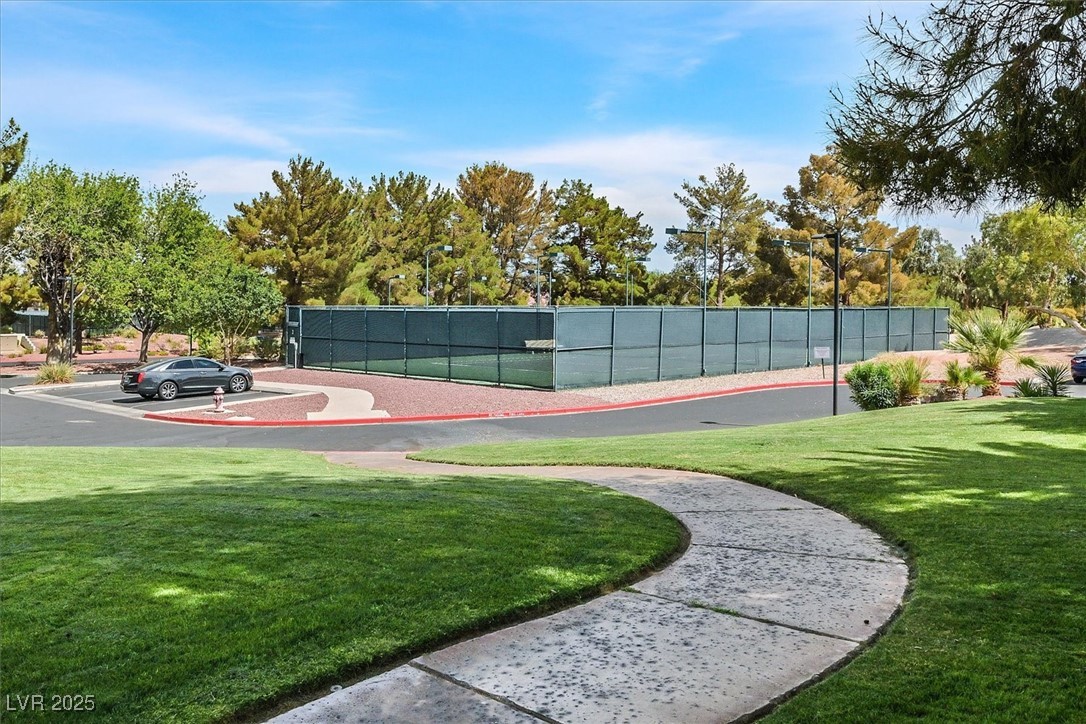 5421 Painted Mirage Road Las Vegas, NV 89149 - Photo 31 of 35 View of sport court featuring fence and a yard