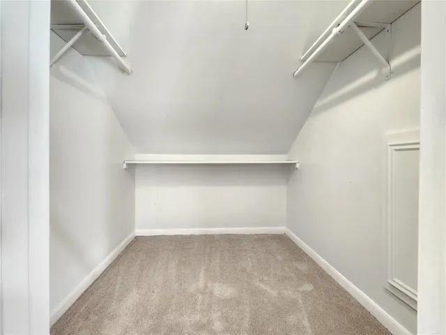 a bathroom with a double vanity sink mirror and