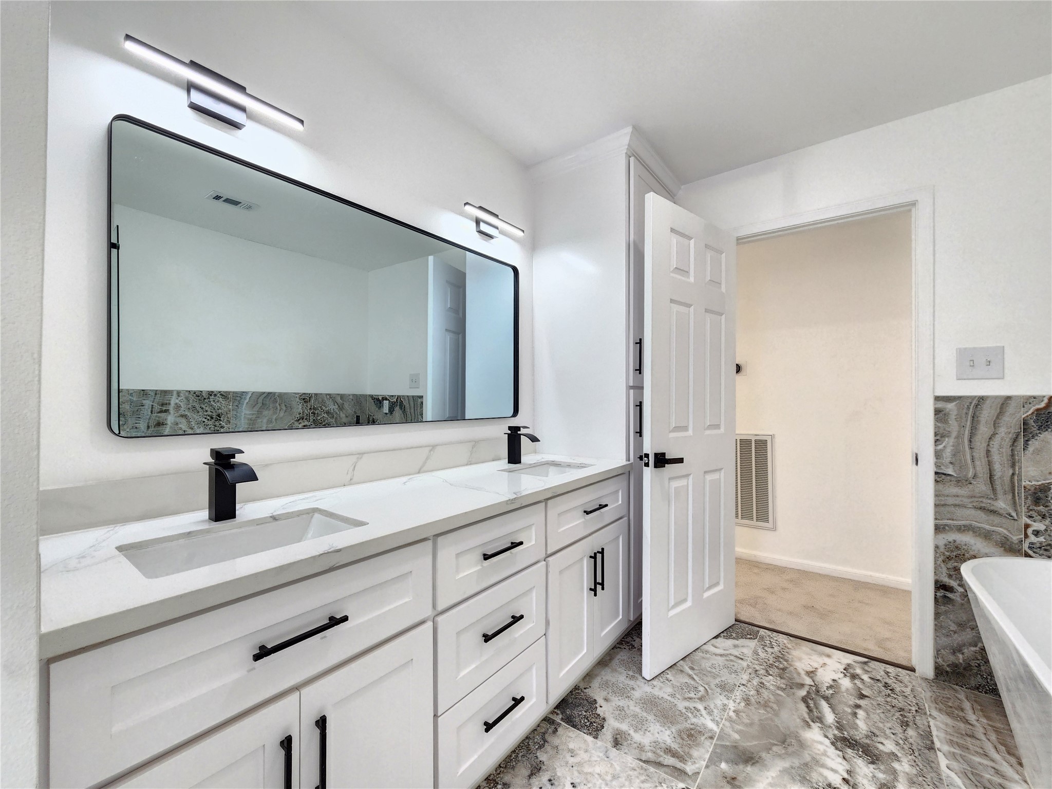 5411 Cobble Lane Spring, TX 77379 - Photo 14 of 31 a bathroom with a double vanity sink mirror and