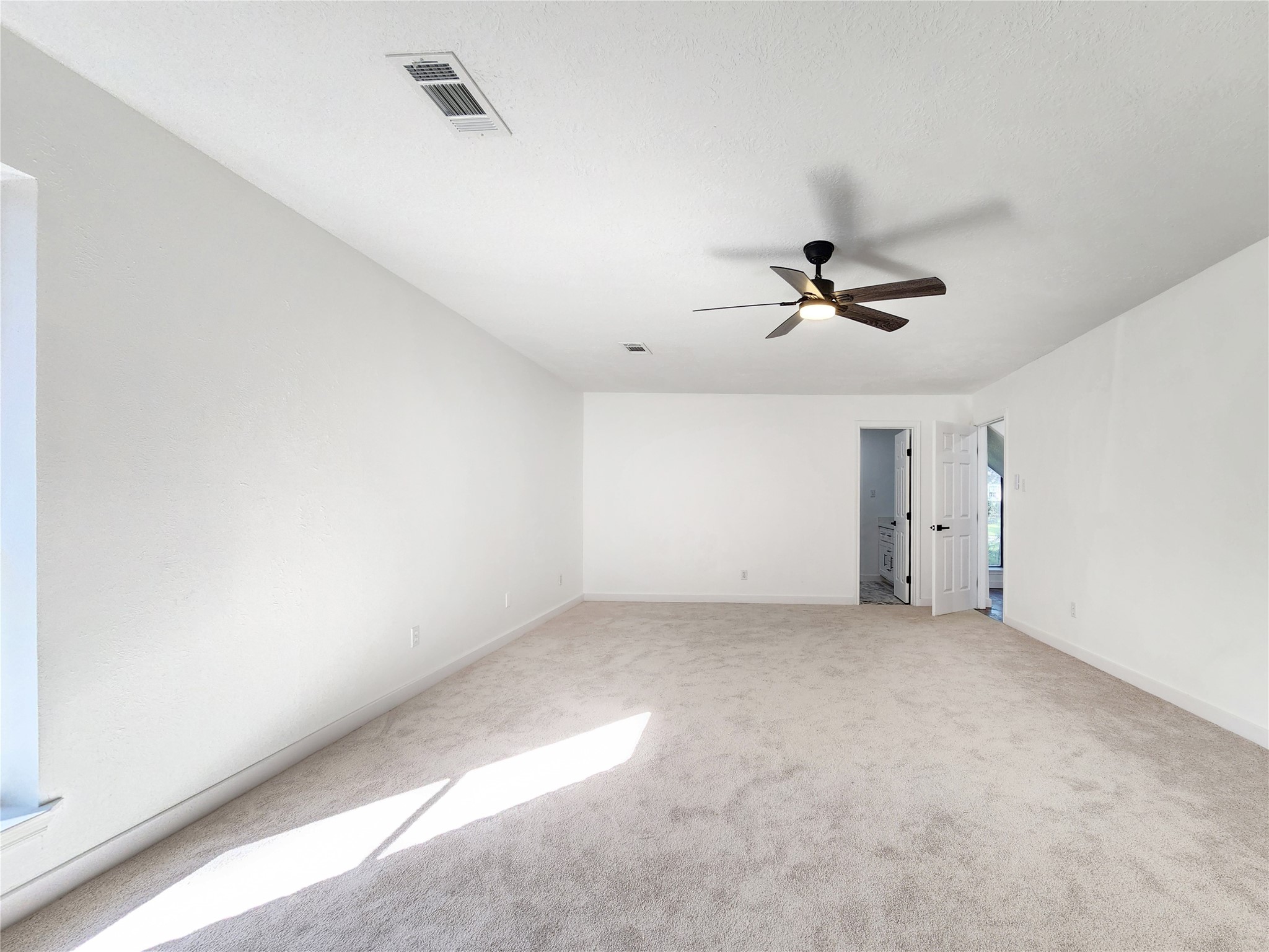 5411 Cobble Lane Spring, TX 77379 - Photo 22 of 31 a view of a room with a ceiling fan