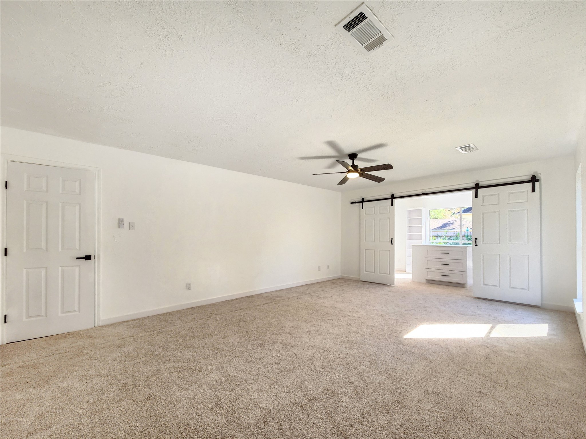 5411 Cobble Lane Spring, TX 77379 - Photo 25 of 31 an empty room with closet and windows