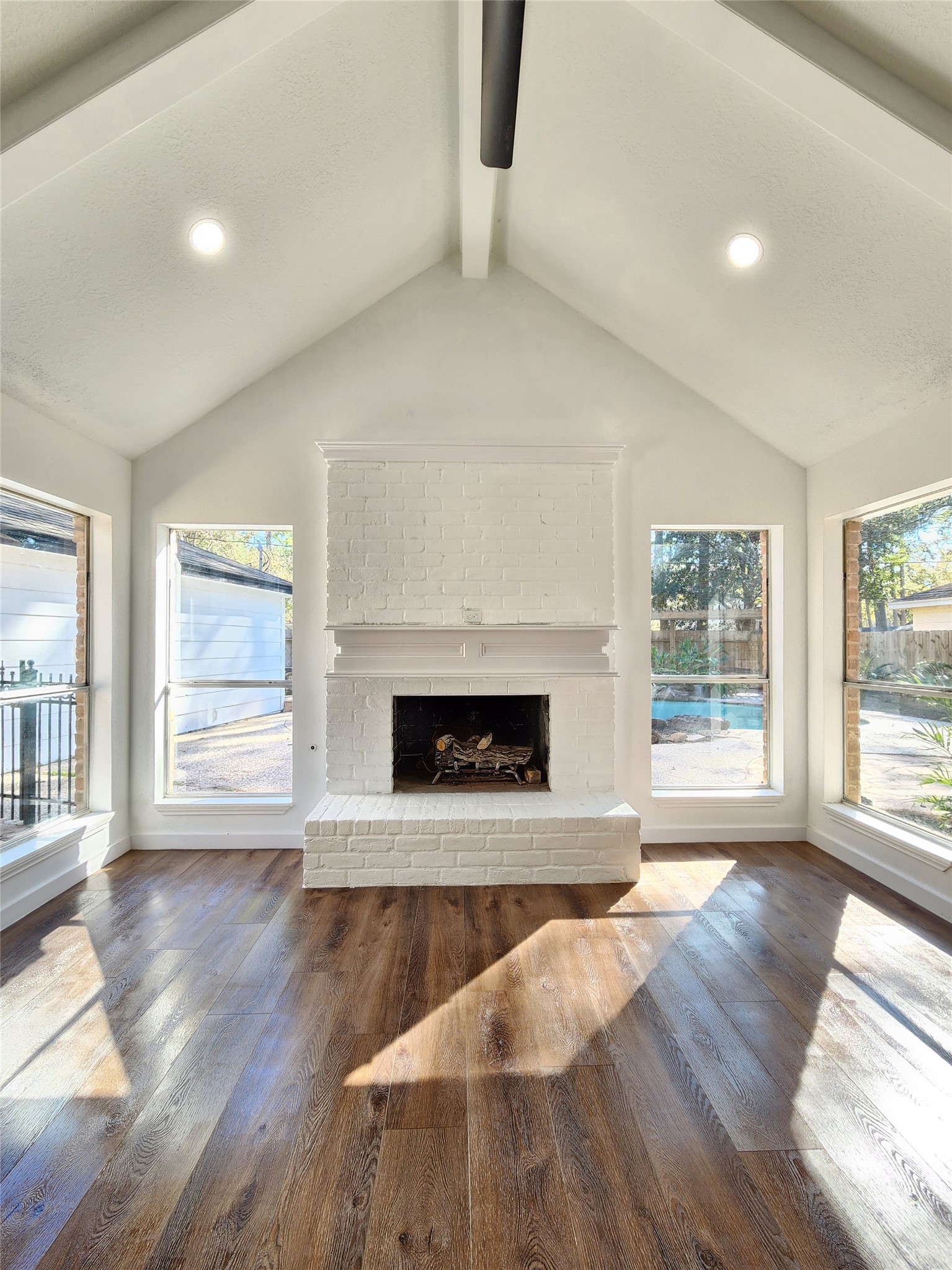 5411 Cobble Lane Spring, TX 77379 - Photo 27 of 31 a view of an empty room with wooden floor and a window
