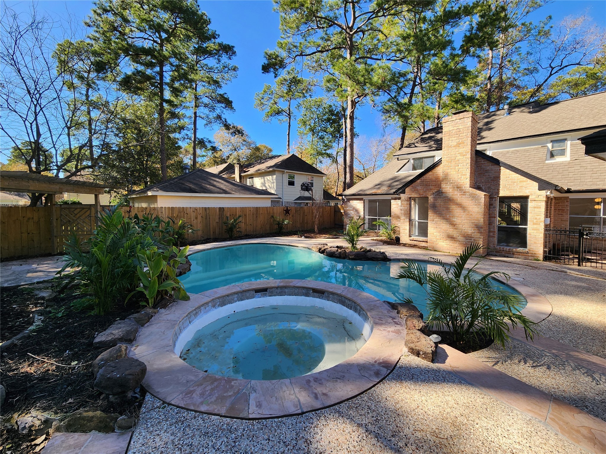 5411 Cobble Lane Spring, TX 77379 - Photo 4 of 31 a view of a house with a backyard
