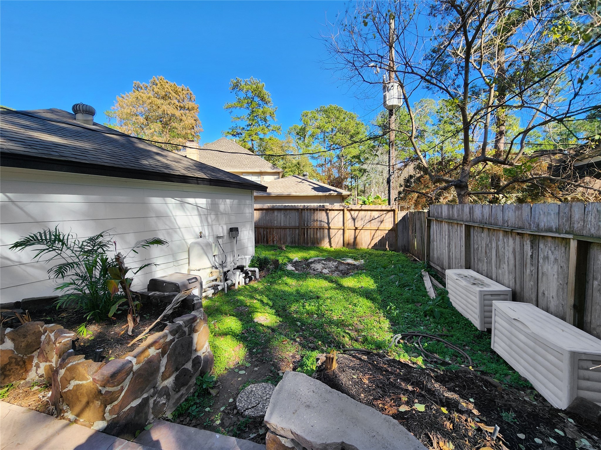 5411 Cobble Lane Spring, TX 77379 - Photo 5 of 31 a front view of a house with garden