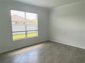 2607 Avolet Court Lakewood Ranch, FL 34211 - Photo 15 of 47 a view of an empty room with a window