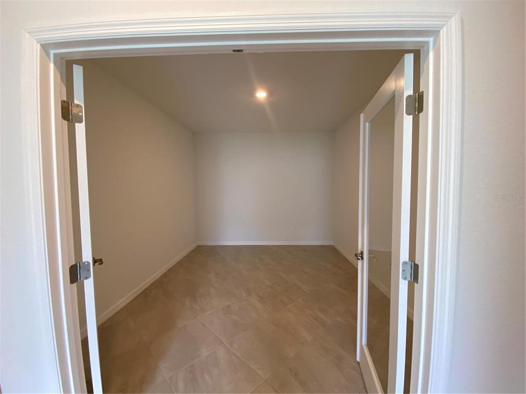 2607 Avolet Court Lakewood Ranch, FL 34211 - Photo 7 of 47 a view of an empty room