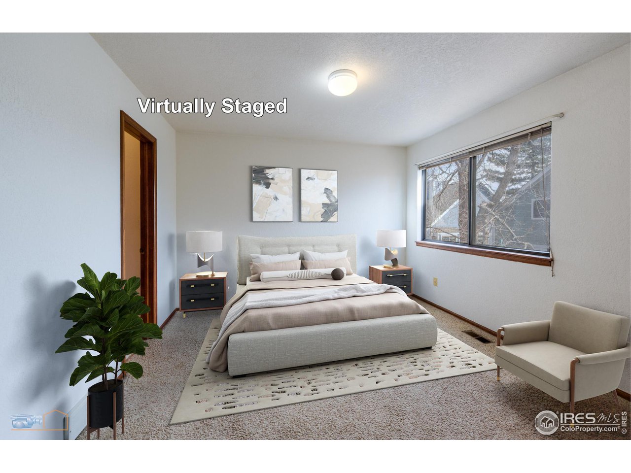 3076 Fulton Circle Boulder, CO 80301 - Photo 11 of 29 a bedroom with a large bed and a potted plant