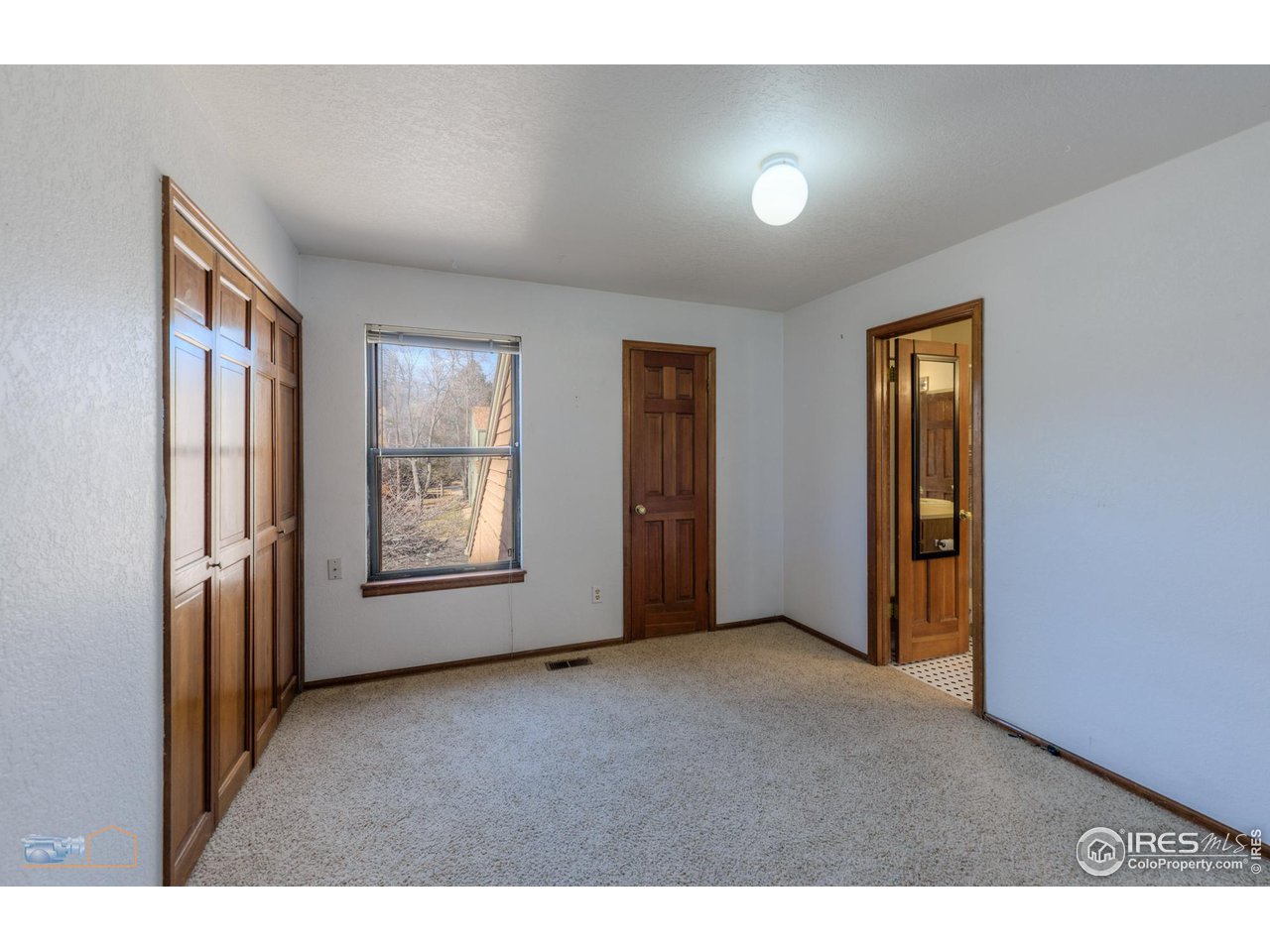 3076 Fulton Circle Boulder, CO 80301 - Photo 16 of 29 a view of an empty room with a window