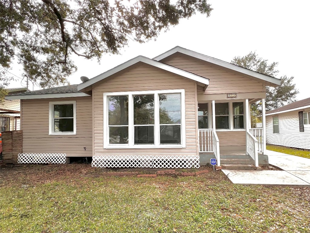 a front view of a house with a garage