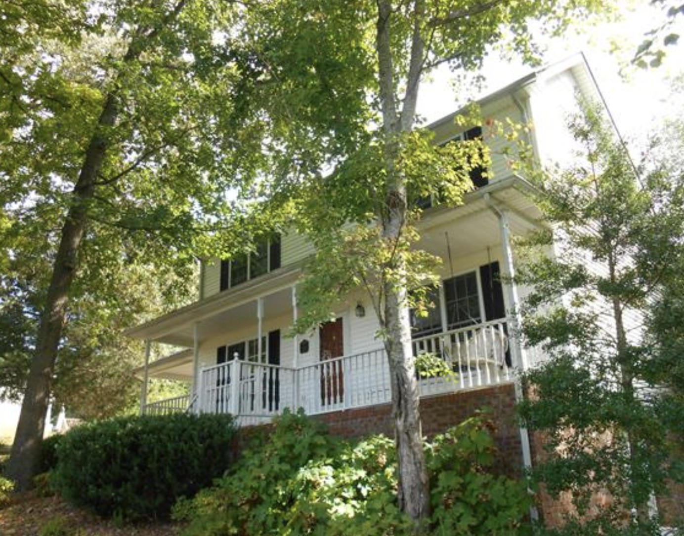 2001 Cherokee Trail Springfield, TN 37172 - Photo 1 of 22 a front view of a house with a garden