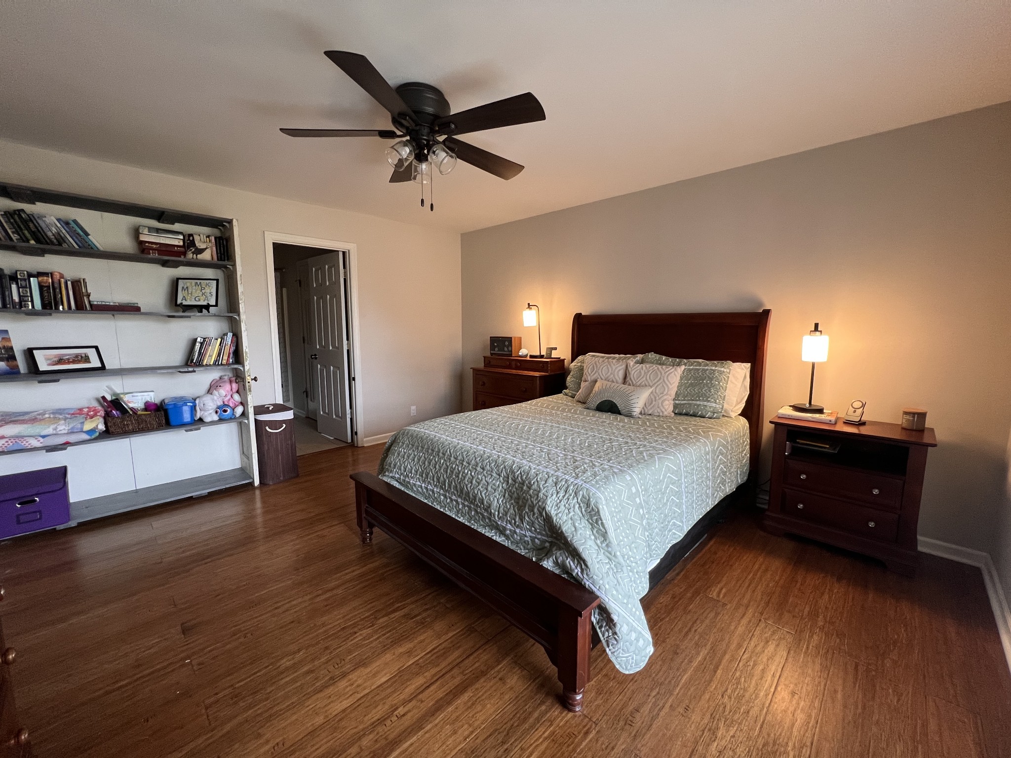 2001 Cherokee Trail Springfield, TN 37172 - Photo 9 of 22 a bedroom with a bed and a chandelier