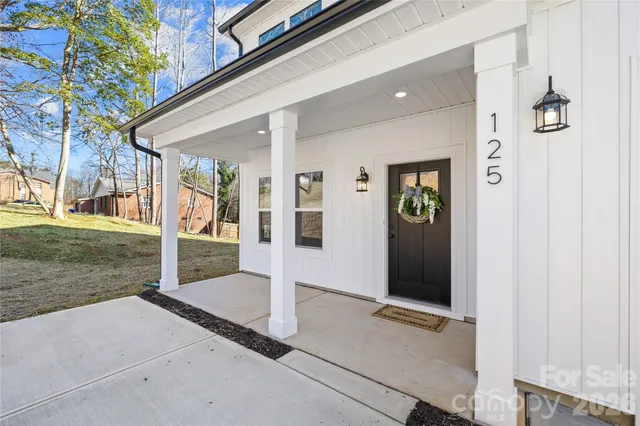 a front view of a house with a porch