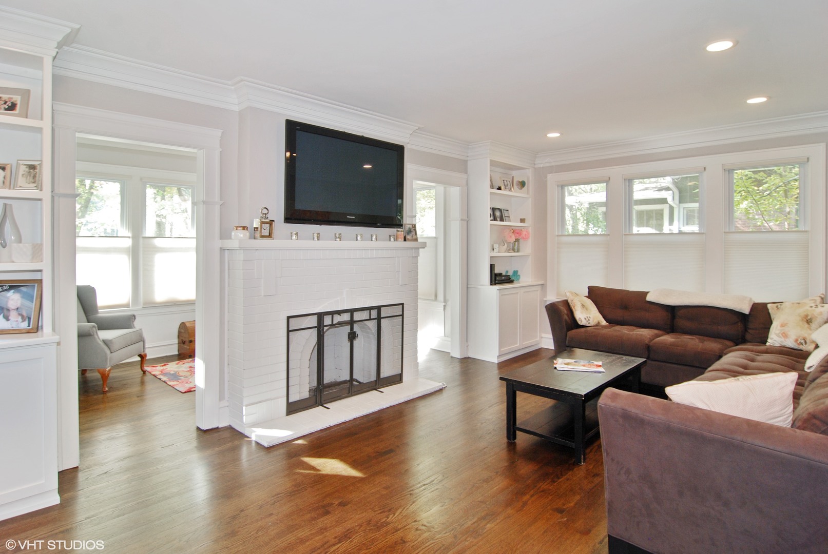 349 Nuttall Road Riverside, IL 60546 - Photo 2 of 25 a living room with furniture fireplace and flat screen tv