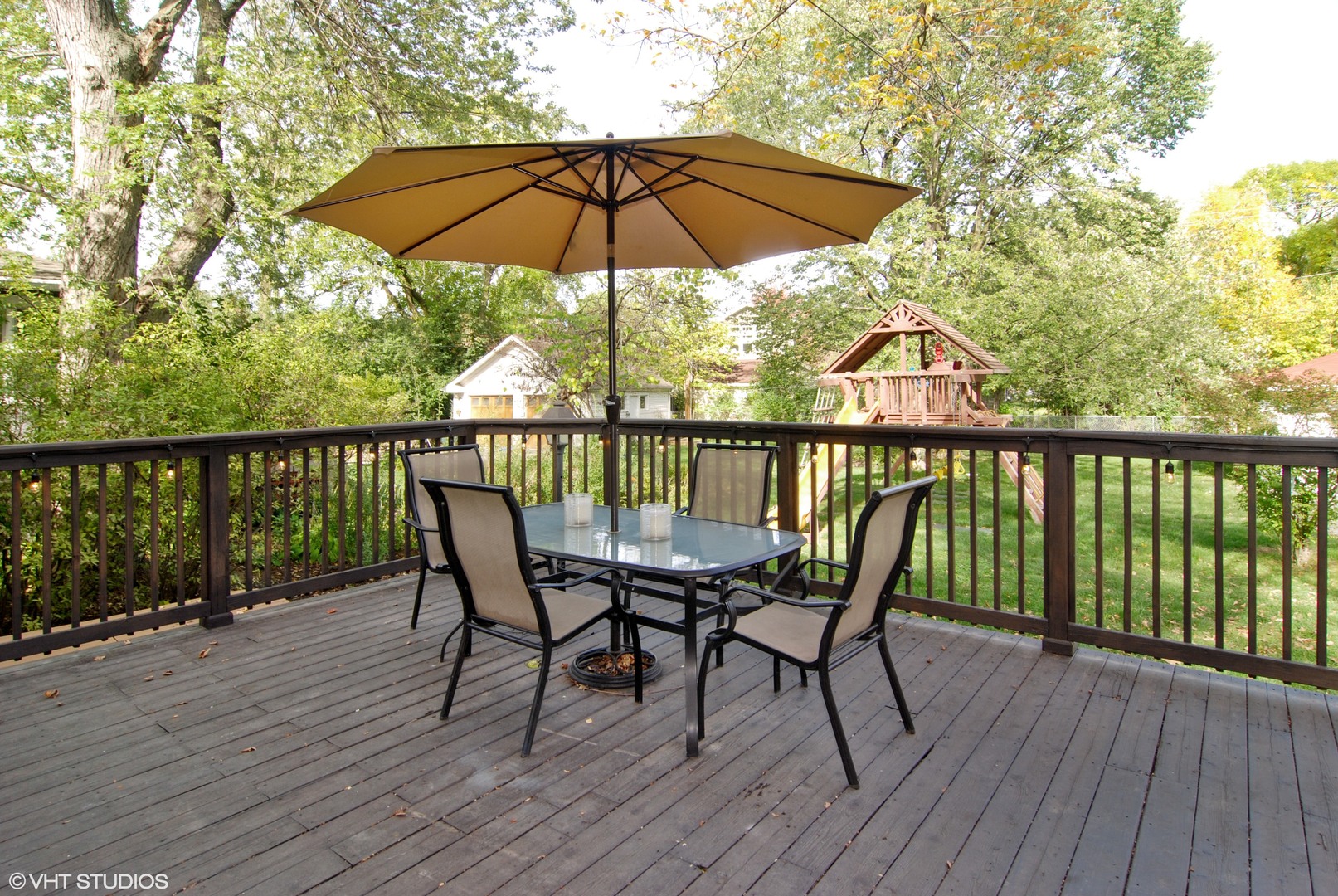 349 Nuttall Road Riverside, IL 60546 - Photo 22 of 25 a view of a deck with furniture and umbrella