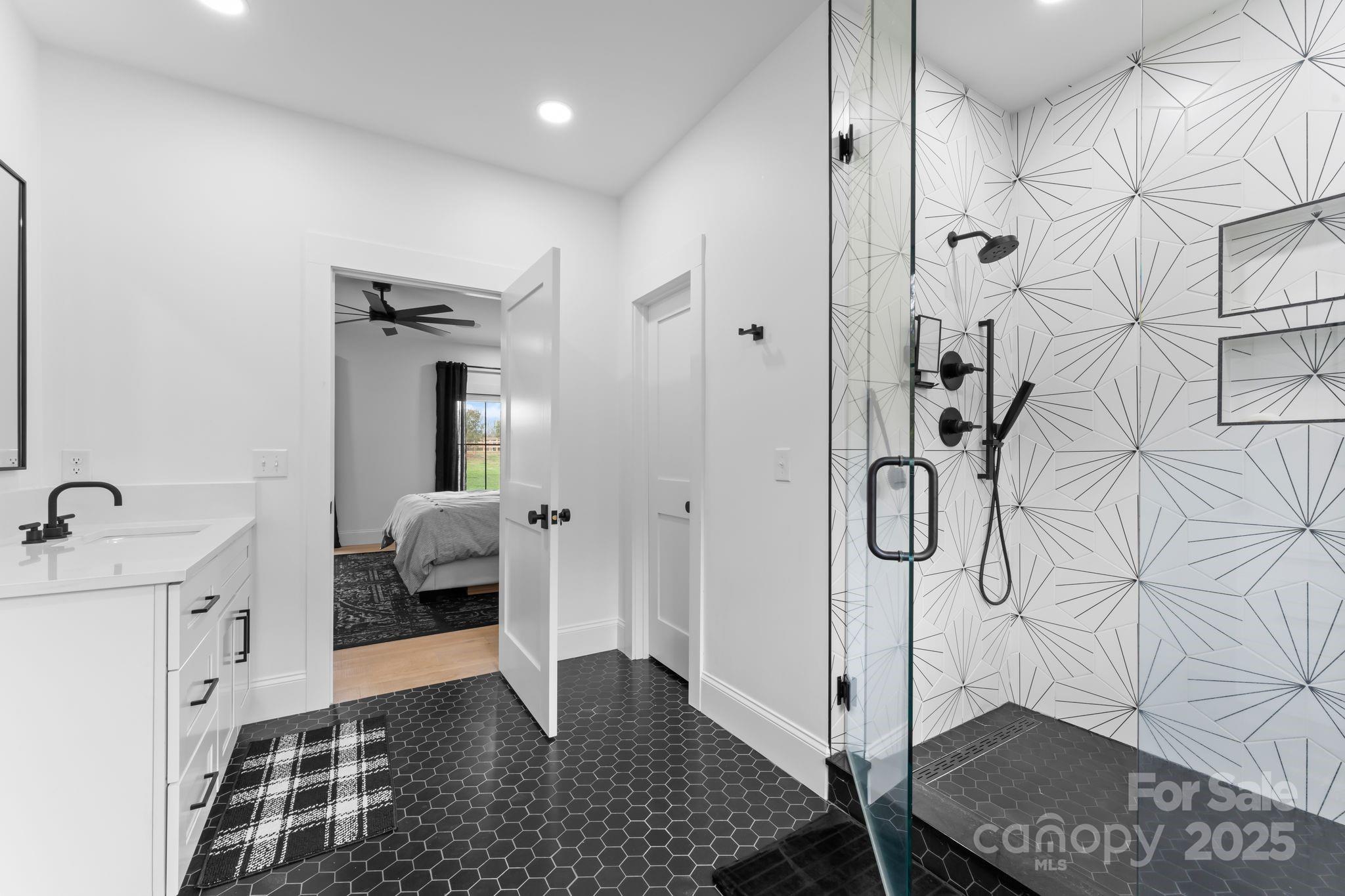 1575 Shinnville Road Cleveland, NC 27013 - Photo 25 of 47 a bathroom with a tub and shower