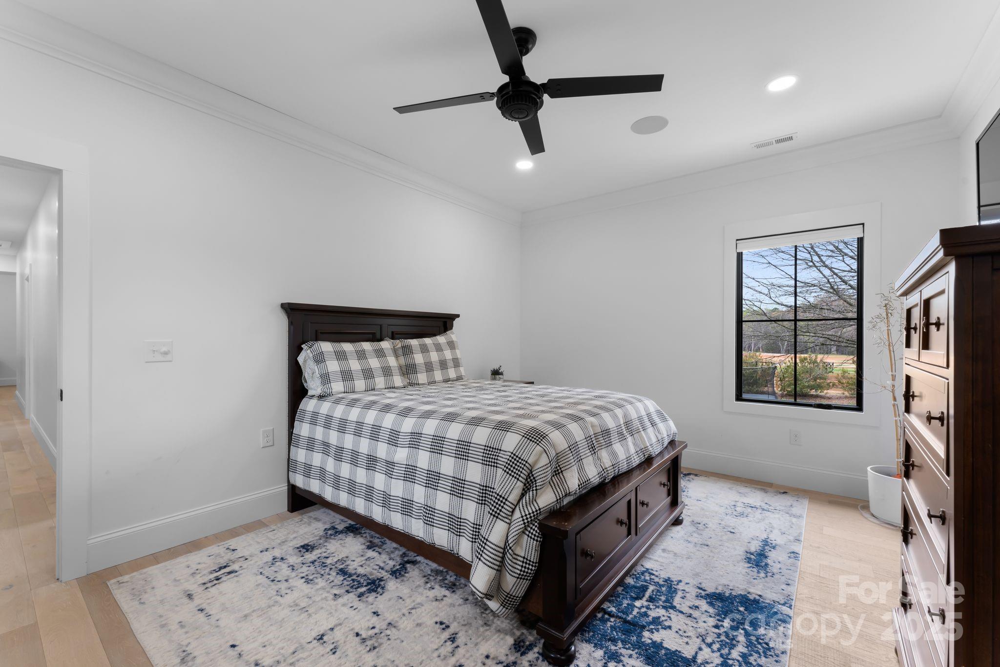 1575 Shinnville Road Cleveland, NC 27013 - Photo 39 of 47 a bedroom with a bed and a window with the view of bathroom